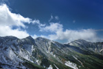 2010.9.26撮影。上ホロカメットク山頂より、富良野岳と三峰山を望む。